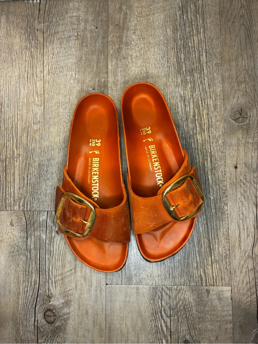 Birkenstock Kids Orange Leather Slip-On Sandals with Gold Buckles